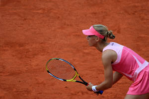 Elena Dementieva Competing On A Clay Court Wallpaper