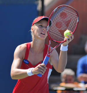 Elena Dementieva In Action On The Tennis Court Wallpaper