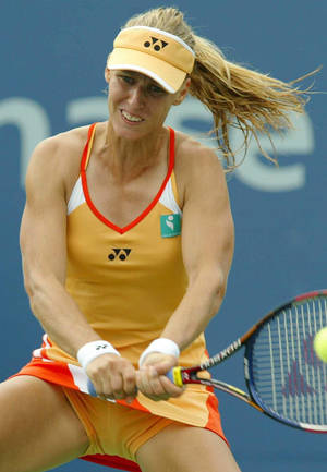 Elena Dementieva Showcasing Strong Arm Muscles Wallpaper