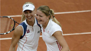 Elena Dementieva With Fellow Tennis Player Wallpaper