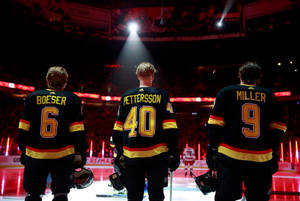 Elias Pettersson With Boeser And Miller Canucks Teammates Wallpaper