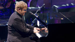 Elton John Artist Playing Piano Wallpaper
