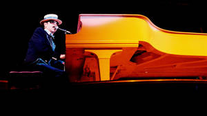 Elton John Gold Piano Concert Wallpaper