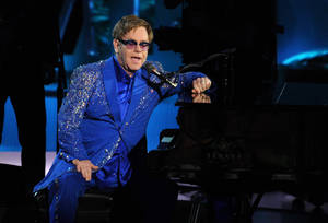 Elton John In Blue Glittered Suit Wallpaper