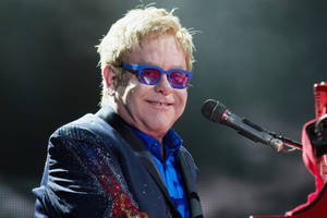 Elton John Piano Artist Smile Wallpaper