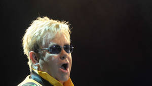 Elton John Yellow Suit Concert Wallpaper