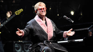 Elton Rocketman Plays Piano Wallpaper