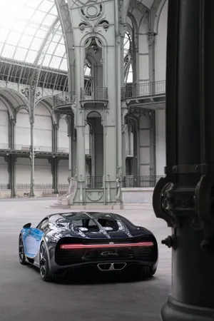 Embrace The Power Of Technology With The Bugatti Phone Wallpaper