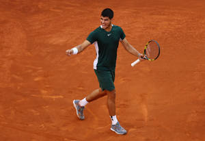 Emerging Tennis Sensation, Carlos Alcaraz In Action Wallpaper