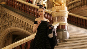 Emily In Paris On A Black Dress Wallpaper
