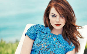 Emma Stone Bewitching Blue Dress Wallpaper