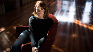 Emma Stone Under Dramatic Lighting Wallpaper