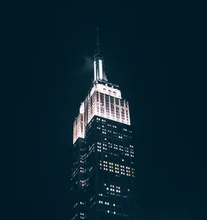 Empire State Building Nyc At Nighttime Wallpaper