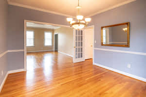 Empty Room With Chandelier Wallpaper