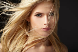 Enchanting Beauty: Radiant Blonde With Fair Skin And Alluring Eyes Wallpaper