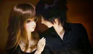 Enchanting Doll Couple Embracing Love Wallpaper