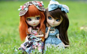Enchanting Pair: Ginger And Brunette Cute Dolls Wallpaper