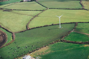 Energy Windmill On The Field Wallpaper