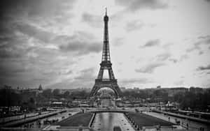 Enjoy A Night View Of Paris Wallpaper