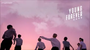 Enjoy A Seamless And Tranquil Desktop With These Soothing Bts Pink Aesthetic Wallpapers Wallpaper