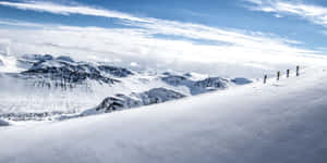 Enjoy The Beautiful View Of A Ski Mountain Wallpaper