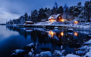 Enjoy The Beauty Of A Peaceful Winter Night. Wallpaper