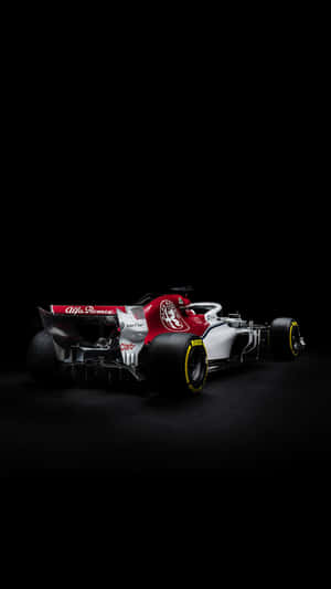 Enjoy The Excitement Of Formula One Racing On Your Iphone Wallpaper