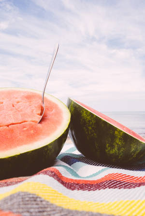 Enjoy The Fresh Summer Taste Of Juicy Watermelons. Wallpaper