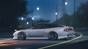 Enjoy The Road In The Striking Nissan Silvia S13 Wallpaper