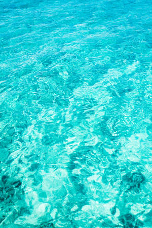 Enjoy The Serenity Of A Sea Of Light Blue Wallpaper