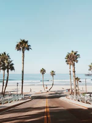 Enjoy The Stunning California Aesthetic With Its Beautiful Beaches, Rolling Hills And Stunning Sunsets. Wallpaper