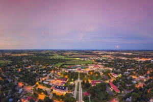 Enjoying A Beautiful Day At Southwestern College In Winfield, Kansas Wallpaper