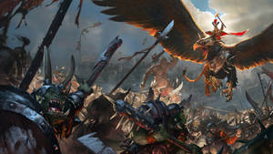 Epic Battle Scene Of Orcs And Gryphon Riders In Total War: Warhammer Wallpaper