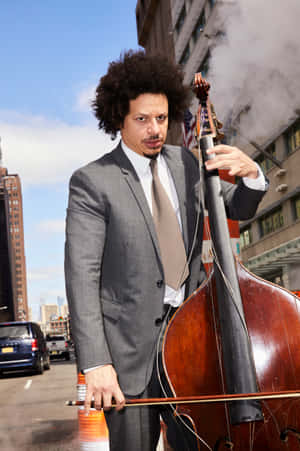 Eric Andre Street Cello Performance Wallpaper