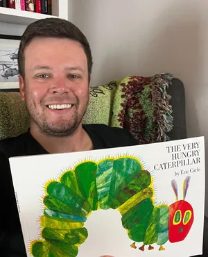 Erik Jones With A Book Entitled