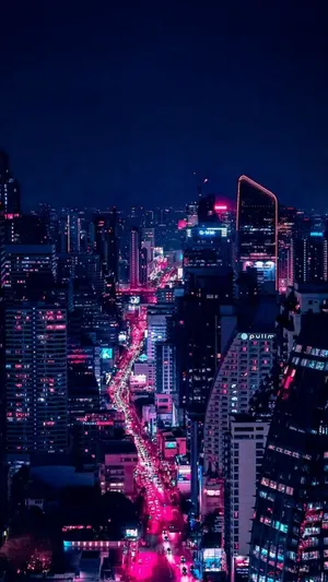 Escape The Mundane By Visiting A Neon City. Wallpaper