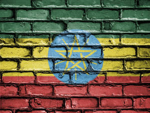 Ethiopia Flag On Brick Wall Wallpaper