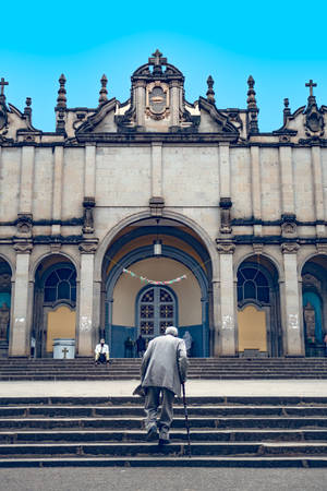 Ethiopia Man Walking To Church Wallpaper
