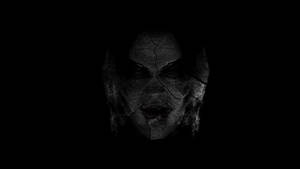 Evil Cracked Face Figure Wallpaper
