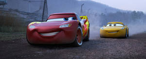 Exciting Race With Lightning Mcqueen And Cruz Wallpaper