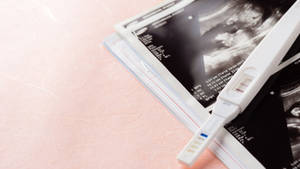 Exciting Times Ahead - Positive Pregnancy Test Kit Wallpaper