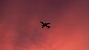 Experience The Beauty Of Flight In A Gorgeous Pink Plane Wallpaper