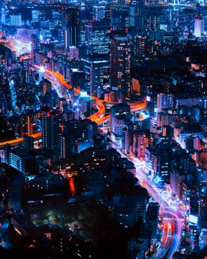 Experience The Buzzing Energy Of Neon City Wallpaper