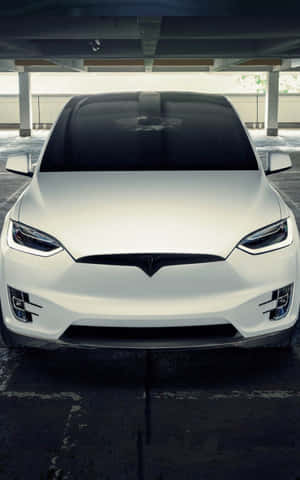 Experience The Future Of Smartphones With Tesla Iphone Wallpaper