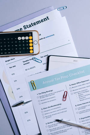 Expert Chartered Accountant Analyzing Financial Statements Wallpaper