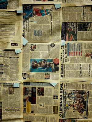 Explore The News Of Yesterday Through An Ancient Newspaper Wallpaper