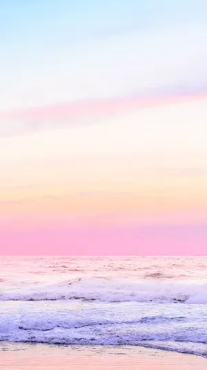 Explore The Pastel Shades Of The Beach Wallpaper
