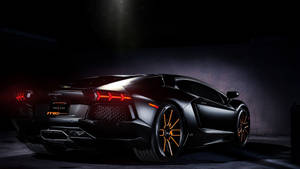 Exquisite Black Lamborghini Aventador S - The Epitome Of Sports Cars Wallpaper