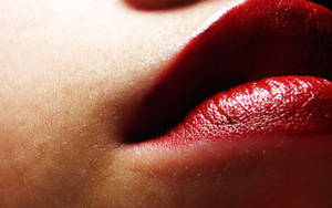 Extreme Close-up Shot Of Red Lips Wallpaper