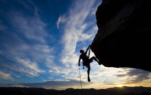 Extreme Sports Rock Climber Silhouette Wallpaper